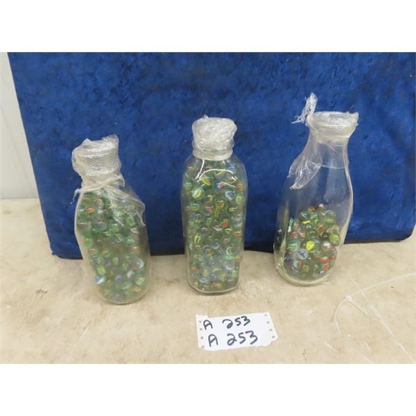 3 Milk Bottles with Marbles -2 full - 1 is1/2