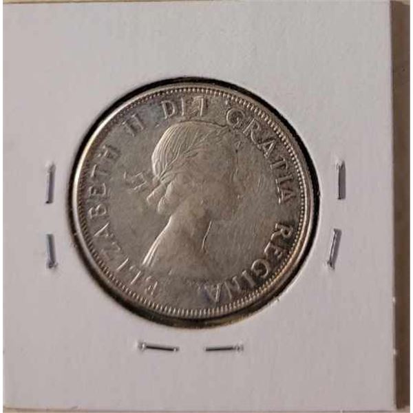 1957 50 cent piece  80% silver  Low mintage 2,171,689