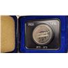 Image 1 : 1973 Canada Proof 66 Dollar in Special Blue Clam Shell with P.E.I I.P.W  etched in holder at top and