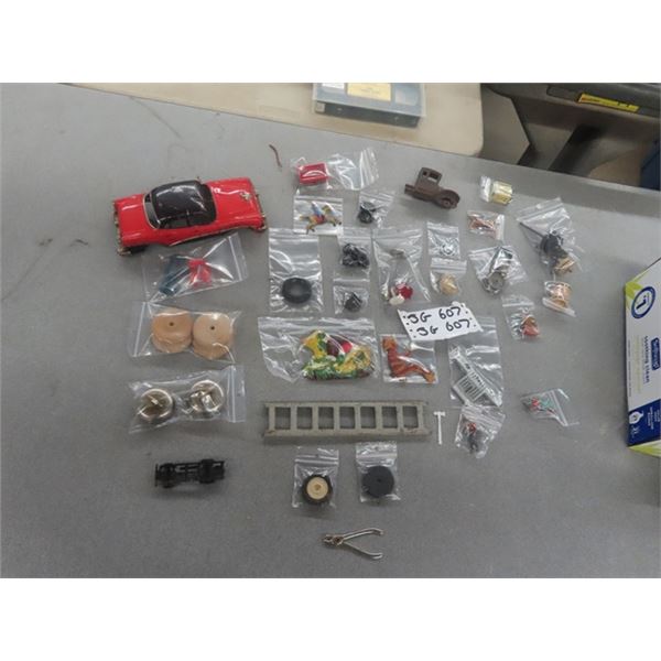 Box of Vintage Toys + Game Parts, including Half a  Cast Iron Truck, a Tin Body of a Car, Dinky Toy 