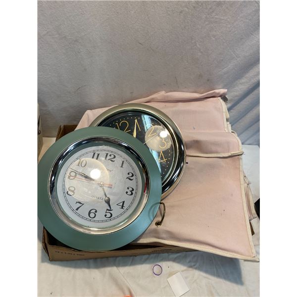 Two clocks and hanging storage