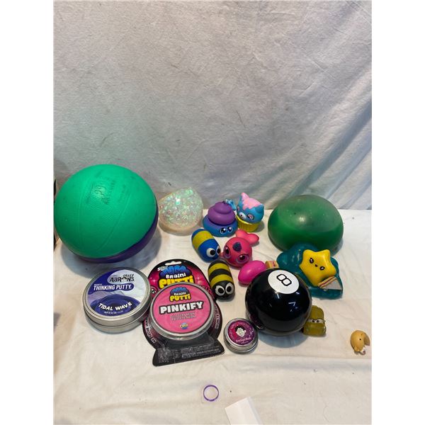Thinking putty, 8 ball and other toys