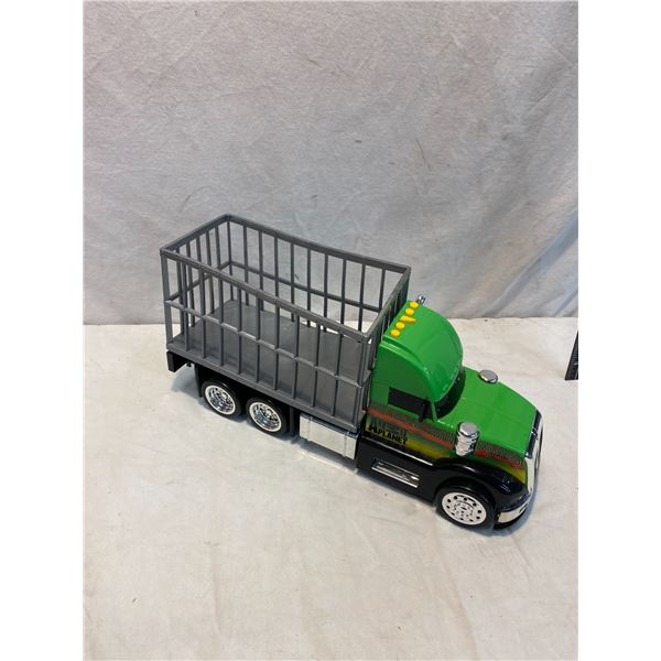Animal planet truck needs batteries makes sounds etc