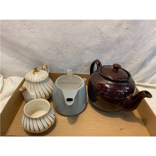 Teapots and sugar dish