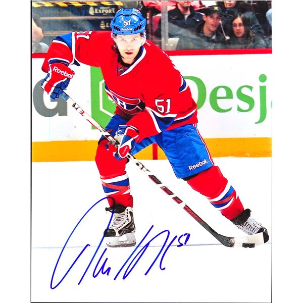Autographed photo set of David Desharnais #51 of the Montreal Canadiens.