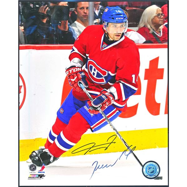 Photo of Thomas Plekanec #14 autographed and approved by the NHL.