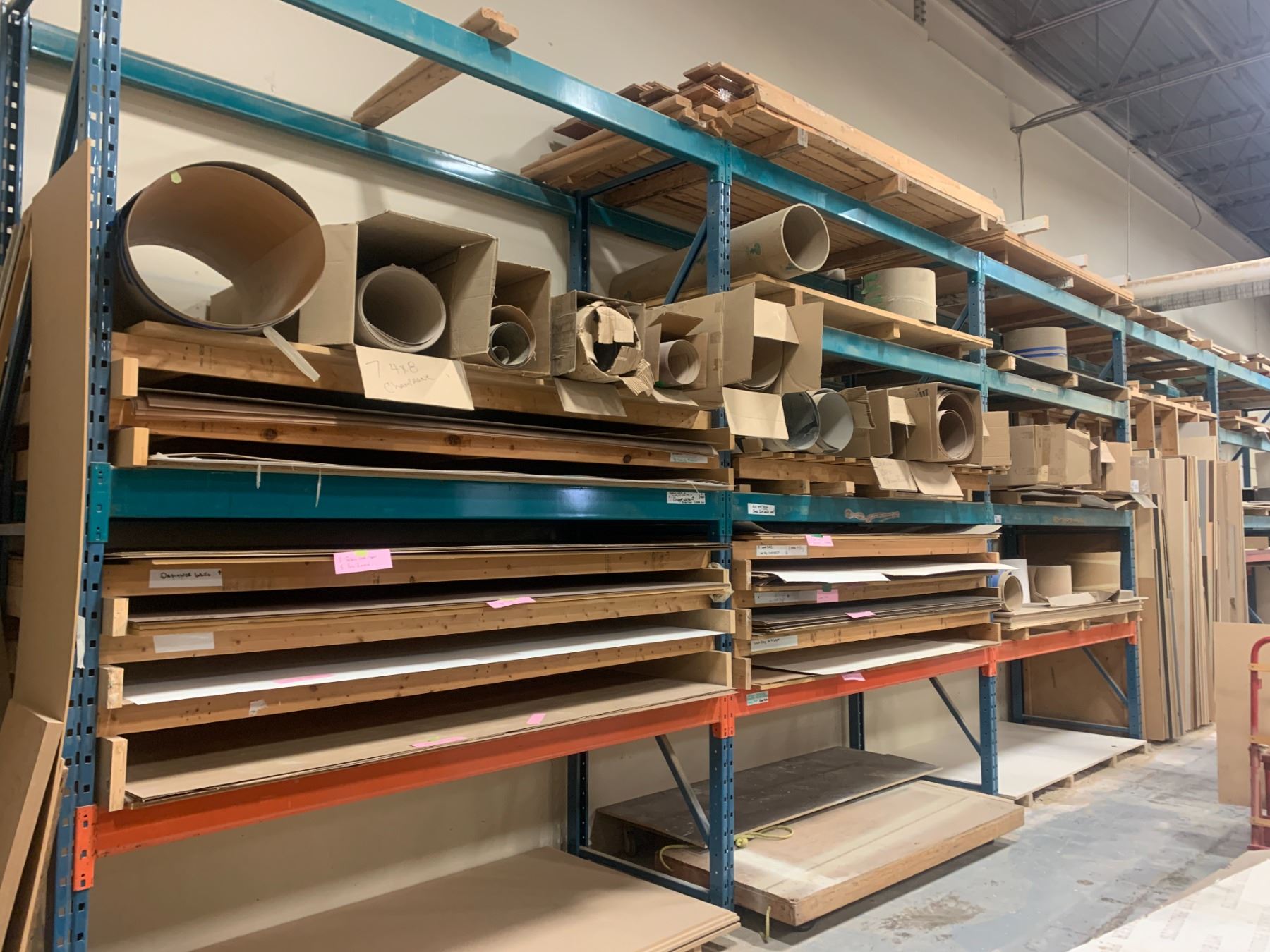 6 BAYS OF PALLET RACKING INCLUDING FULL SHEETS OF VENEER, ROLLED VENEER ...