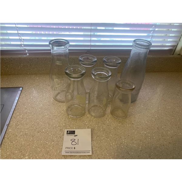 Collection of 17 City Dairy Antique Milk Bottles