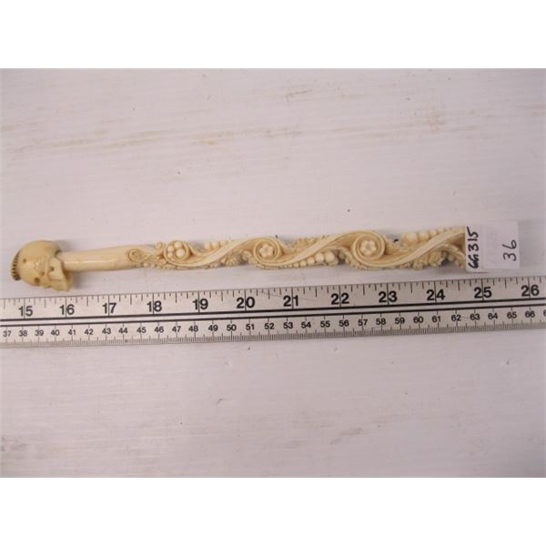 IVORY CARVED ROD WITH THE SKULL TOP