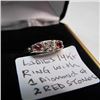 Image 1 : LADIES 14KT RING WITH 1 DIAMOND & 2 RED STONES, SIZE 5.5