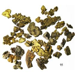 Lot of many natural gold nuggets and a few small cut pieces, from the Espadarte (1558).