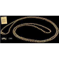 Long gold necklace of over 600 links.