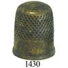 Image 1 : Medium brass sailmaker's thimble, uncleaned.