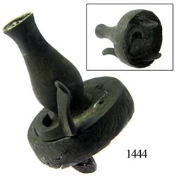 Bronze spout (from a shot bag or lamp?).