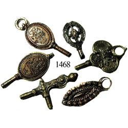 Lot of 6 cuprous watch keys and fobs.