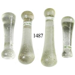 Lot of 4 glass apothecary's pestles.