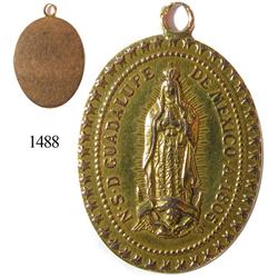 Ornate rose-gold (14K) medallion of the Virgen de la Guadalupe, dated 1805.