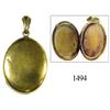 Image 1 : Gold oval locket.
