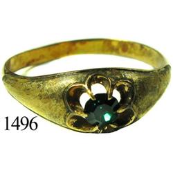 Low-grade gold ring with green stone.