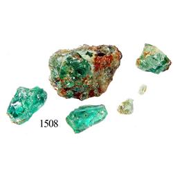 Emerald cluster and loose stones.