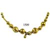 Image 1 : Lot of 16 small gold beads strung together on a wire.