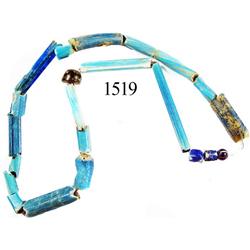 Small glass-bead necklace, mostly cylindrical blue beads.