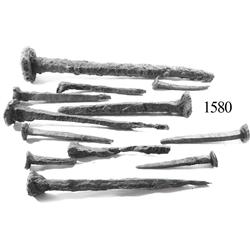 Lot of 12 iron spikes.