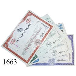 Lot of 4 Real Eight Co. stock certificates (one of each color).