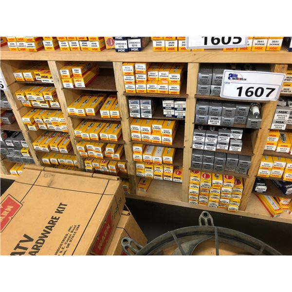 4 SECTIONS OF ASSORTED SPARK PLUGS