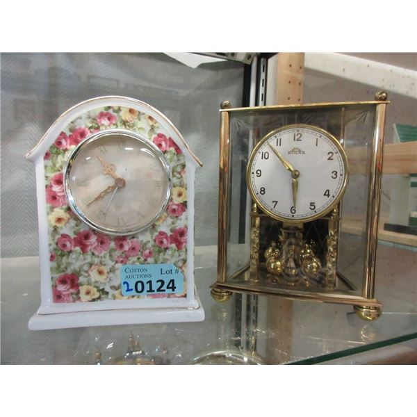 1 Porcelain and 1 Solar Brass Clock