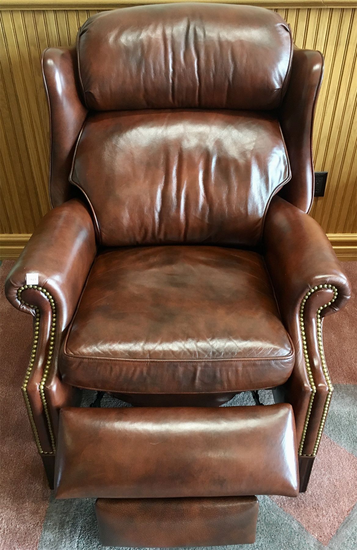 LEATHER WING BACK RECLINER - RUST TONE - Kidd Family Auctions