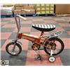 Image 1 : VINTAGE SUPER CYCLE WITH TRAINING WHEELS