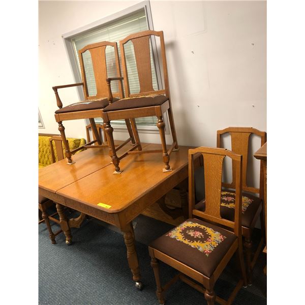 Dining Room Table complete with six needpoint chairs - comes with table extensions   Base Table is c