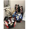 Image 1 : Corner Lot of Misc. Hockey Protective Gear - Goalie Pads and Hockey Bags