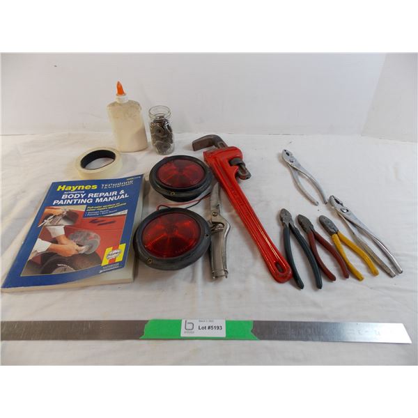 Large pipe wrench, pliers, washers, misc