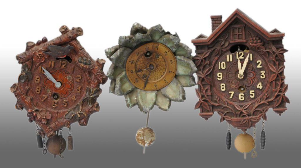 Lot of 3 Miniature Figural Novelty Clocks.