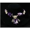Image 1 : Hands with Amethyst Tulips Necklace.