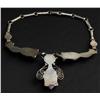 Image 2 : Hands with Amethyst Tulips Necklace.