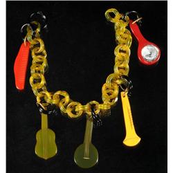 Bakelite Bracelet with Instruments.