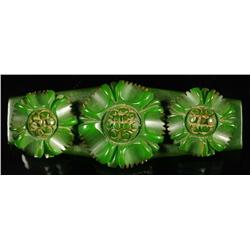 Bakelite Green Pin with Moveable Flowers.