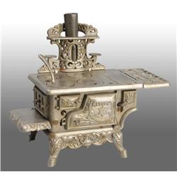 Cast Iron Rescent Toy Children's Stove.