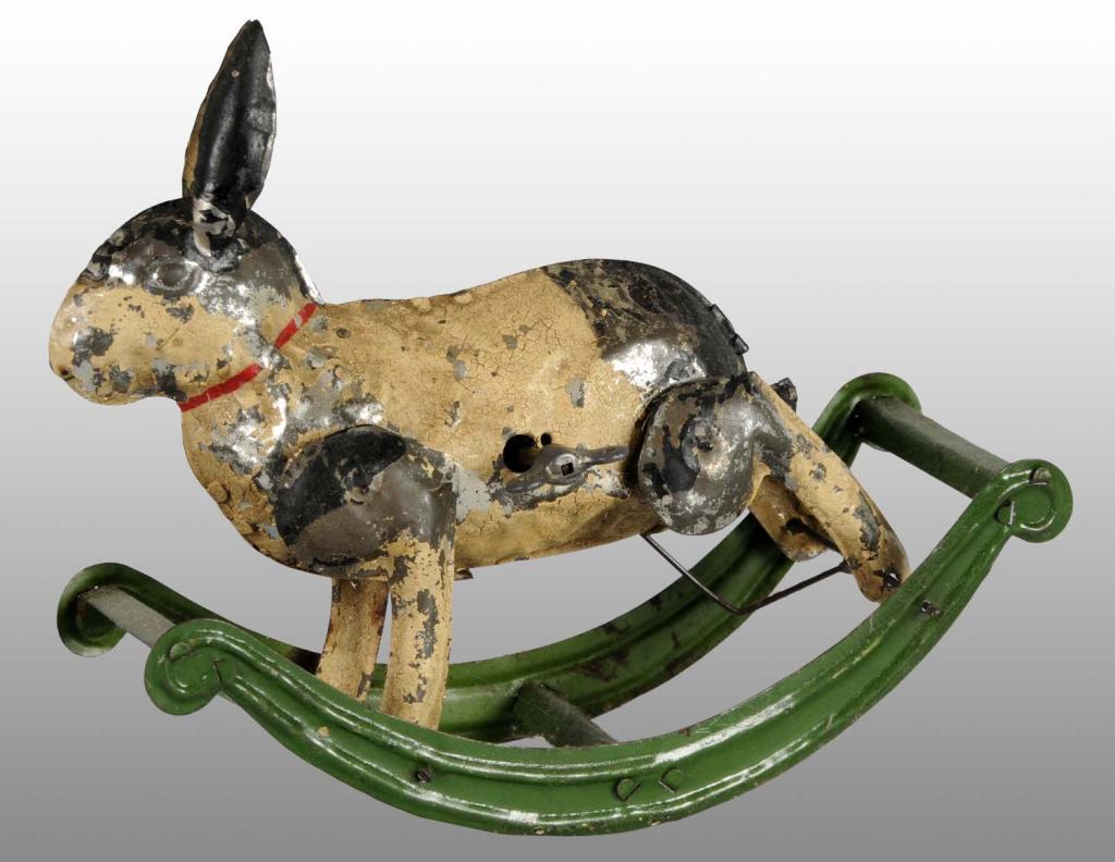 Tin Hand-Painted Rabbit on Rocker Wind-Up Toy.