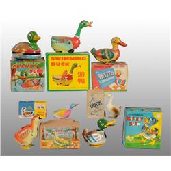 Lot of 11: Tin Duck Toys.