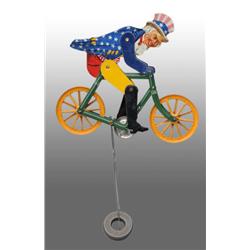 Tin Litho Uncle Sam Bicycle Toy.