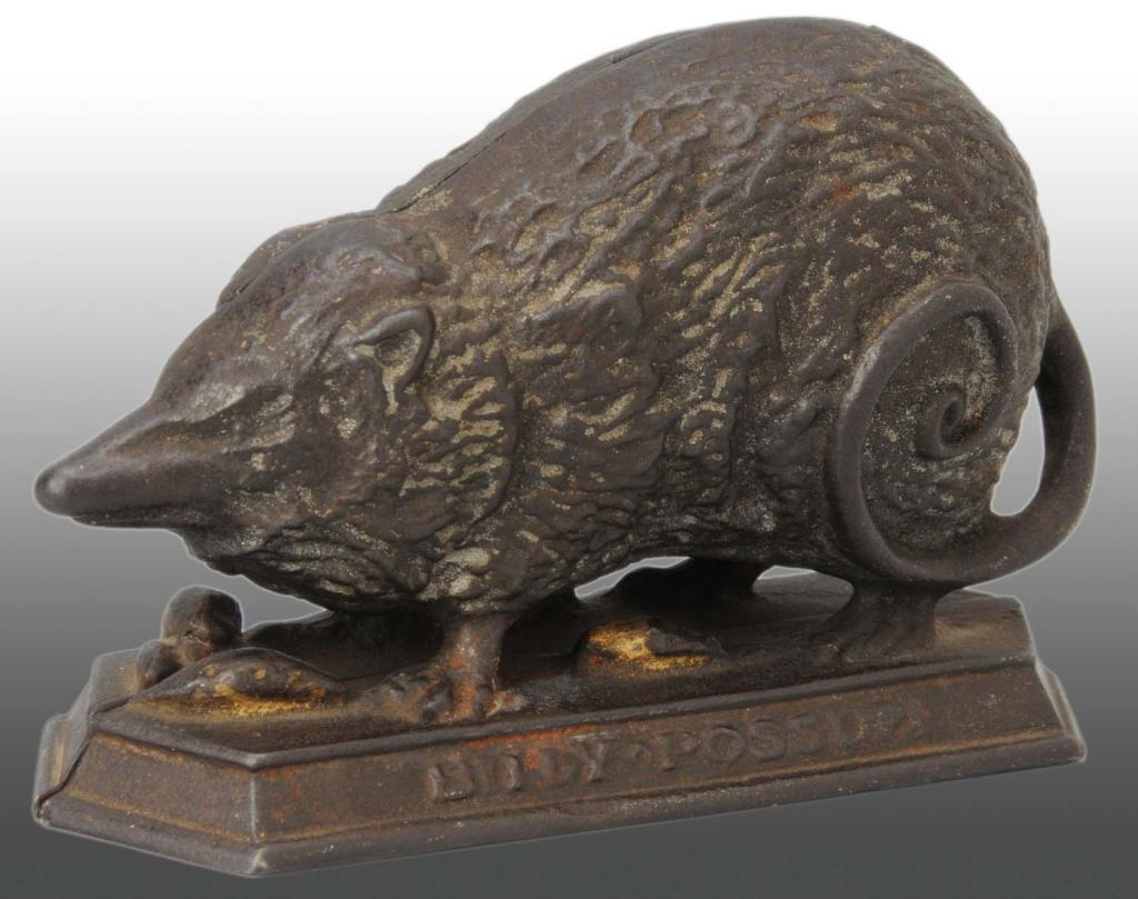 Cast Iron Billy Possum Still Bank.