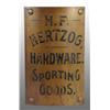 Image 1 : Brass Hertzog Hardware & Sporting Goods Sign.