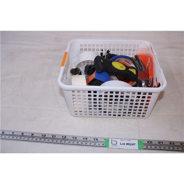 White plastic basket with misc items