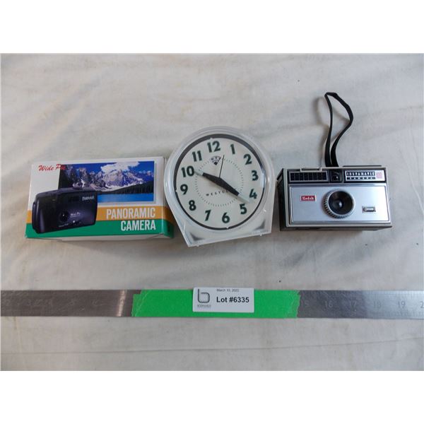 Kodak instamatic 100camera + readers digest panarama camera + alarm clock