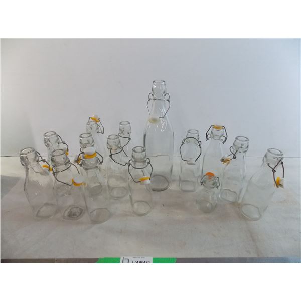 (15) swing top clear bottles - variety of sizes