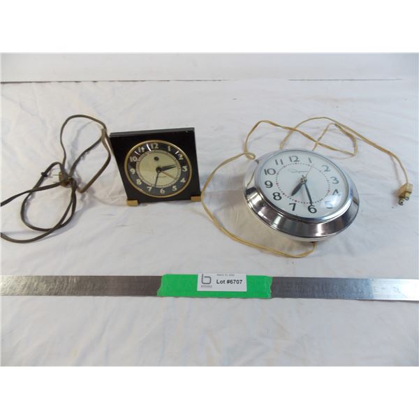(2) vintage electric clocks